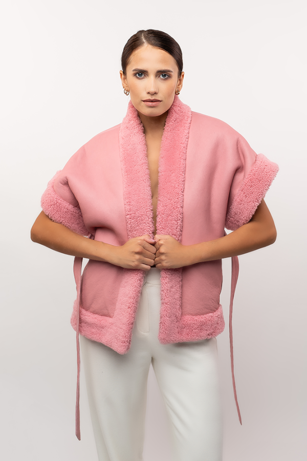 Powder pink shearling vest