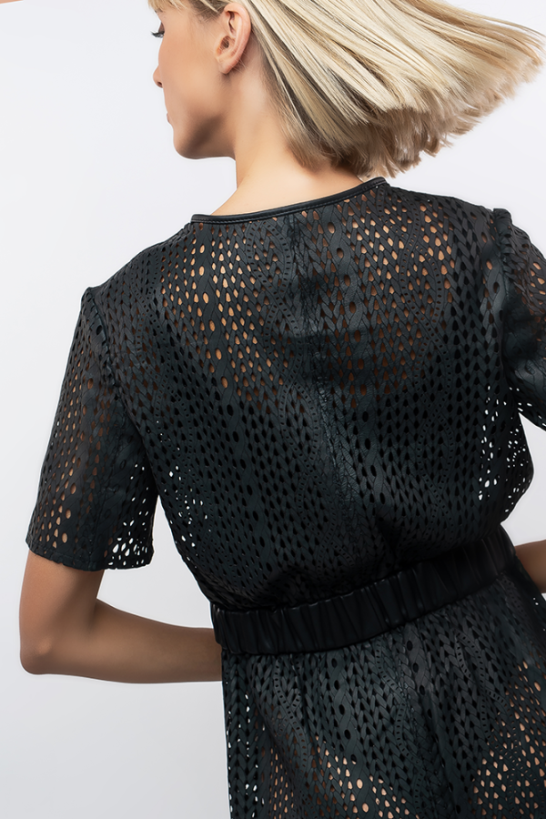 A jumpsuit made from perforated leather - Image 3